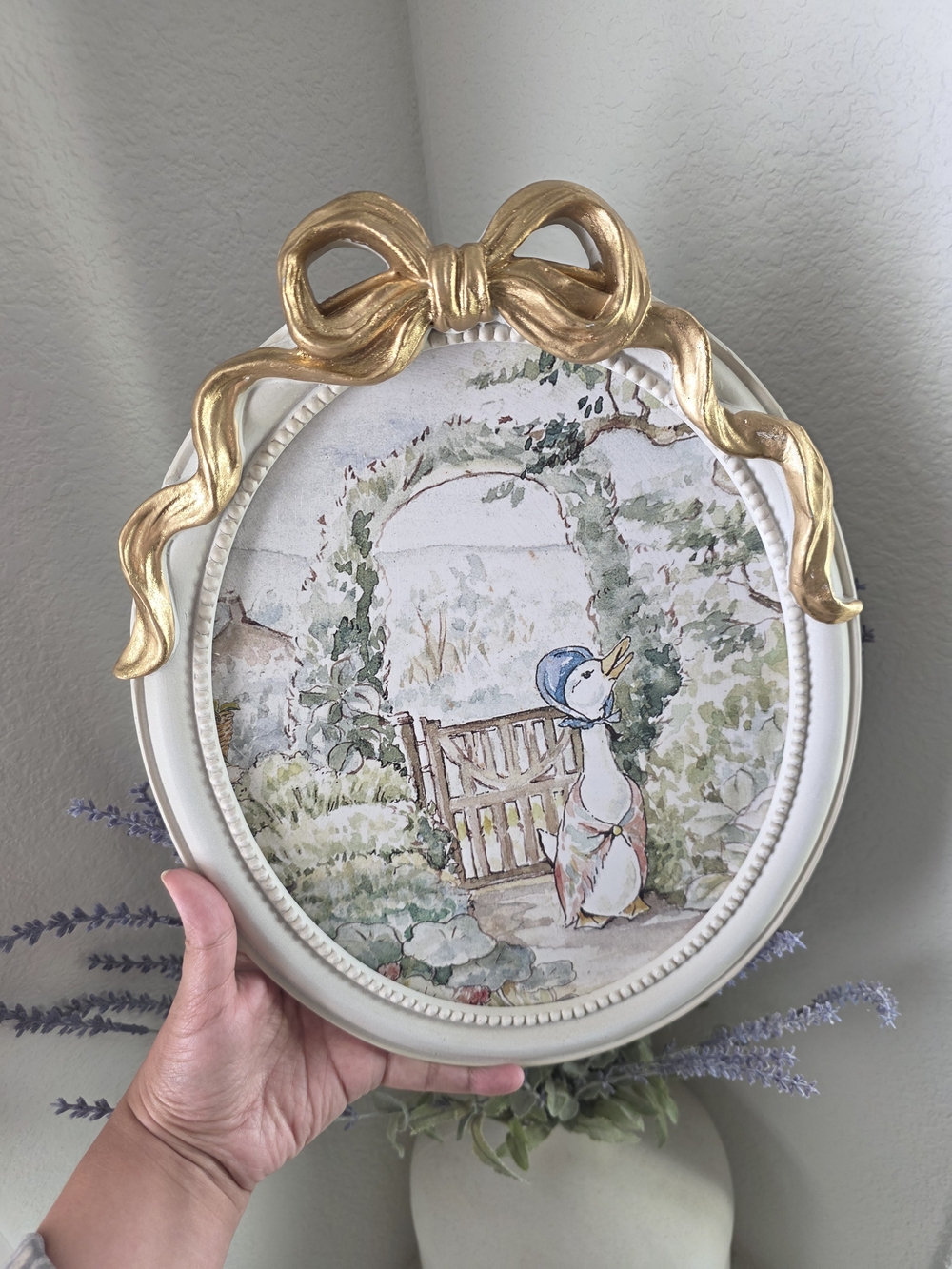 Mother Goose Oval Framed Nursery Artwork with Gold Bow